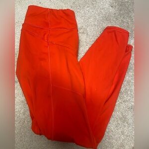 Athleta orange leggings size small